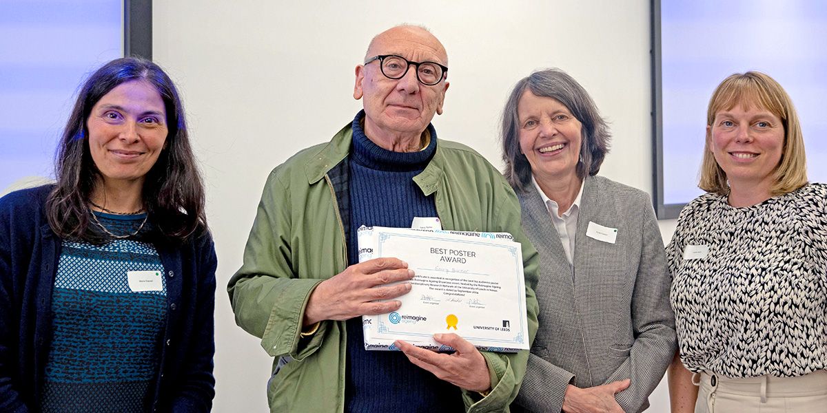 Garry Barker with his best poster award, stood with Maria Kapsali, Anne Forster and Sarah Astill.