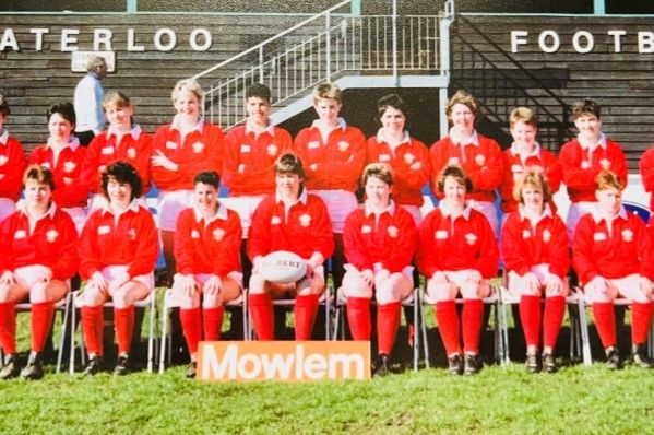 A group of women looking at the camera who played for Wales RUFC in 1989. 