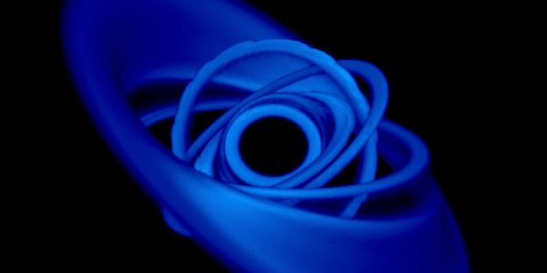 Bright blue overlapping rings - a snapshot of a simulation of a disk that is misaligned to the spin of a black hole.