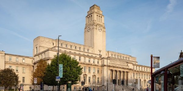 The Parkinson Building with blue sky and trees