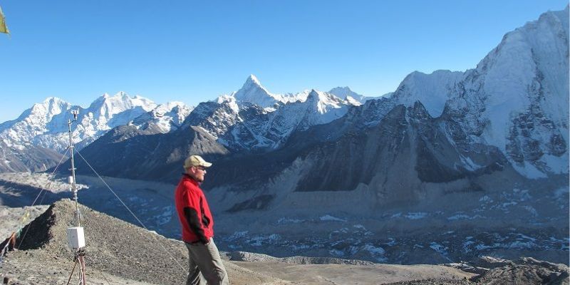 Professor Duncan Quincey surveys the debris-covered tongue of the Khumbu Glacier from the peak of Kala Patthar, Nepal, where his previous project EverDrill measured ice temperatures as deep as 200 metres into the glacier.