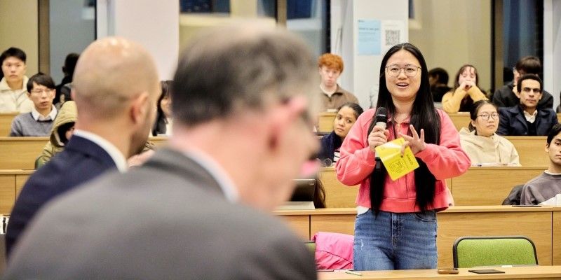 Ning Yang asking Sir Dave Ramsden a question