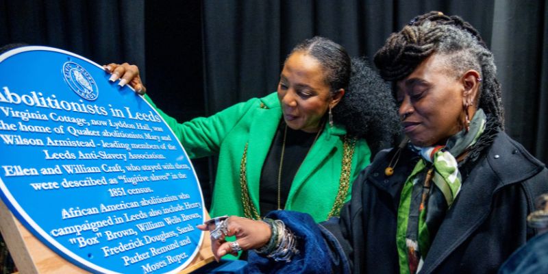 Councillor Abigail Marshall Katung, Lord Mayor of Leeds, and poet Khadijah Ibrahim view the plaque