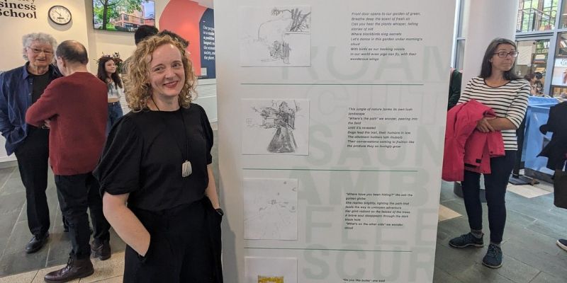 Denise Webber with her sketches at the Walking to Zero exhibition