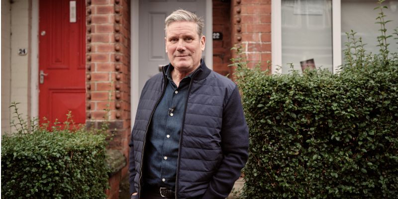 Sir Keir Starmer stands outside the Hyde Park house where he lived as a University of Leeds student.