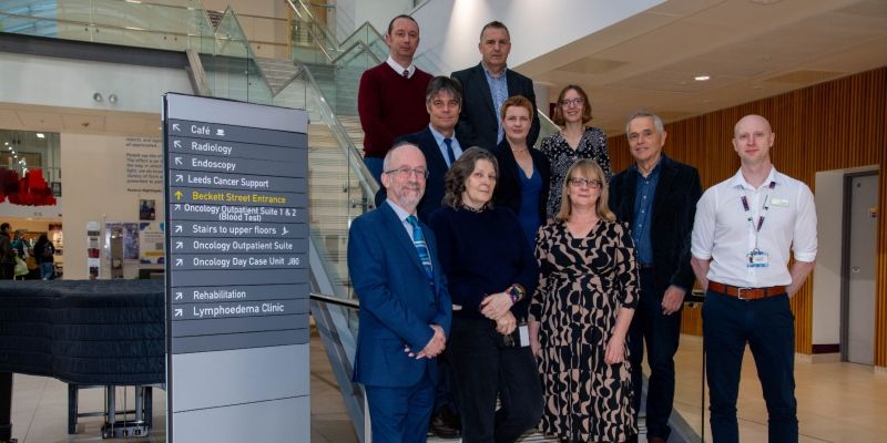 Members of the RadNet Leeds team standing on the stairs in Nexus